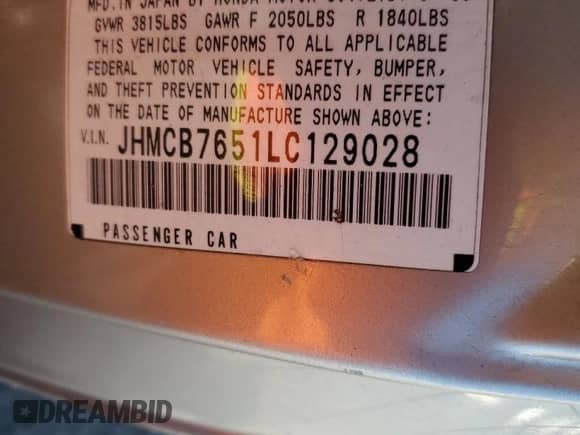 1990 Honda Accord LX with VIN JHMCB7651LC129028, listed as a Copart auction lot 82001875 with 158,454 mi miles and Salvage title. Bid and sale history available at DreamBid. Image 12.