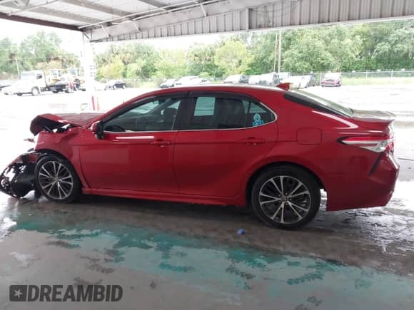 2020 Toyota Camry SE z VIN 4T1G11AK0LU380855, wystawiony jako IAAI lot #43170051 z przebiegiem 63 234 mil mil oraz . Historia ofert i sprzedaży dostępna na DreamBid. Obrazek 14.