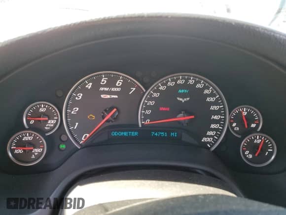 2006 Chevrolet Corvette Z06 с VIN 1G1YY26E265100745, выставлен на аукционе Copart как лот 70367574 с пробегом 74 751 миль миль и Списание • Salvage title. История ставок и продаж доступна на DreamBid. Изображение 9.