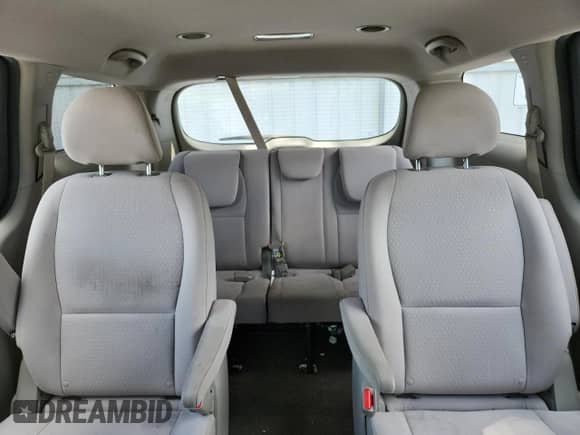 2017 Kia Sedona L z VIN KNDMA5C13H6284071, wystawiony jako Copart lot #66113925 z przebiegiem 80 057 mil mil oraz Szkoda całkowita • Salvage title. Historia ofert i sprzedaży dostępna na DreamBid. Obrazek 10.