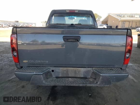 2012 Chevrolet Colorado Work Truck z VIN 1GCCSBF98C8155264, wystawiony jako Copart lot #81781825 z przebiegiem Nie podano mil oraz Szkoda całkowita • Salvage title. Historia ofert i sprzedaży dostępna na DreamBid. Obrazek 6.