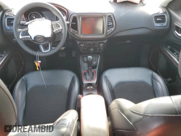 2017 Jeep Compass Trailhawk with VIN 3C4NJDDB9HT674796, listed as a Copart auction lot 80738795 with 58,865 mi miles and Salvage title. Bid and sale history available at DreamBid. Image 8.