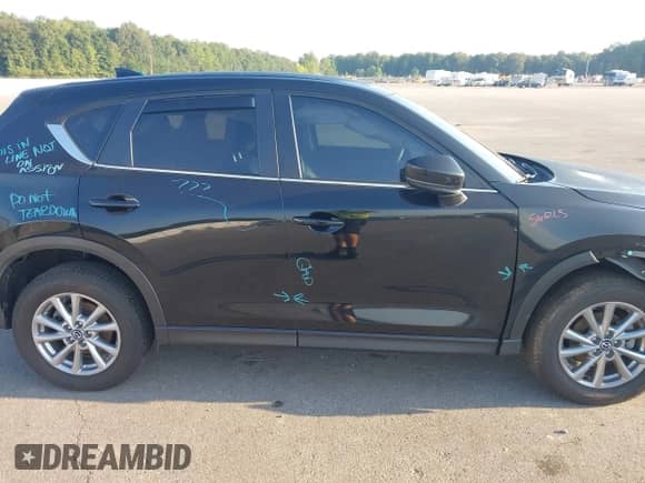 2023 Mazda CX-5 S Select с VIN JM3KFBBM2P0222012, выставлен на аукционе IAAI как лот 43009040 с пробегом 34 310 миль миль и . История ставок и продаж доступна на DreamBid. Изображение 13.