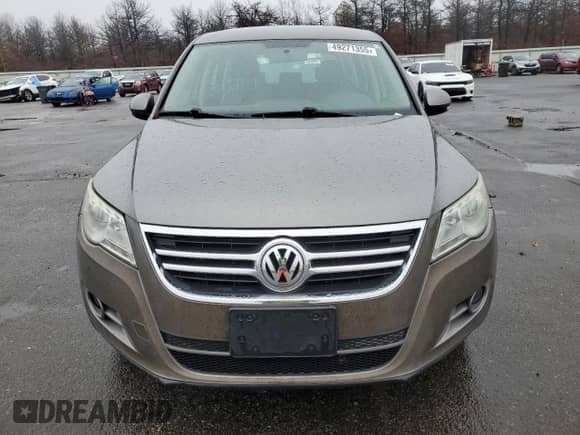 2009 Volkswagen Tiguan с VIN WVGCV75N19W511508, выставлен на аукционе Copart как лот 49271355 с пробегом 143 197 миль миль и Чистый • Clean title. История ставок и продаж доступна на DreamBid. Изображение 5.
