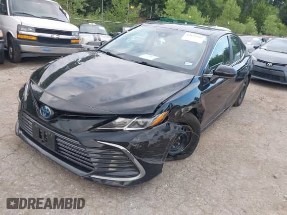 2022 Toyota Camry Hybrid LE with VIN 4T1C31AK3NU585808, listed as a IAAI auction lot 42633297 with 34,066 mi miles and . Bid and sale history available at DreamBid. Image 17.
