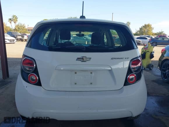 2015 Chevrolet Sonic LT with VIN 1G1JC6SH2F4121897, listed as a IAAI auction lot 43310992 with 128,444 mi miles and . Bid and sale history available at DreamBid. Image 16.