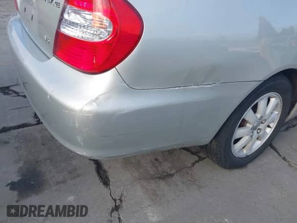 2003 Toyota Camry LE z VIN 4T1BF30K33U559514, wystawiony jako IAAI lot #43518376 z przebiegiem 203 514 mil mil oraz . Historia ofert i sprzedaży dostępna na DreamBid. Obrazek 16.