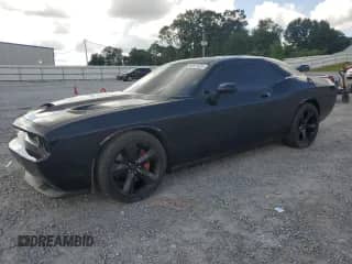 2008 Dodge Challenger SRT-8 with VIN 2B3LJ74W78H289470, listed as a Copart auction lot 64997625 with 83,301 mi miles and Salvage title. Bid and sale history available at DreamBid. Image 1.