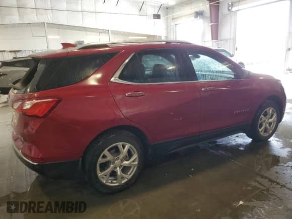 2020 Chevrolet Equinox Premier с VIN 3GNAXXEV5LS539148, выставлен на аукционе Copart как лот 70192185 с пробегом 76 001 миль миль и Списание • Salvage title. История ставок и продаж доступна на DreamBid. Изображение 3.