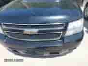 2009 Chevrolet Suburban 2LT z VIN 1GNFC26029R170963, wystawiony jako IAAI lot #43108526 z przebiegiem 244 916 mil mil oraz . Historia ofert i sprzedaży dostępna na DreamBid. Obrazek 6.