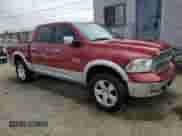 2014 Ram 1500 Laramie with VIN 1C6RR7NM3ES276788, listed as a Copart auction lot 61612765 with 194,315 mi miles and Salvage title. Bid and sale history available at DreamBid. Image 4.