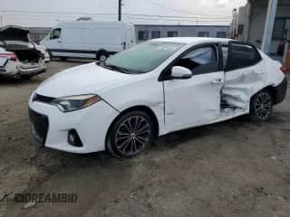 2016 Toyota Corolla L z VIN 5YFBURHE2GP409098, wystawiony jako Copart lot #70521655 z przebiegiem 136 781 mil mil oraz Szkoda całkowita • Salvage title. Historia ofert i sprzedaży dostępna na DreamBid. Obrazek 1.