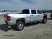 2016 Chevrolet Silverado 2500HD Work Truck z VIN 1GC1KUE85GF300886, wystawiony jako Copart lot #48476585 z przebiegiem 113 934 mil mil oraz Szkoda całkowita • Salvage title. Historia ofert i sprzedaży dostępna na DreamBid. Obrazek 3.