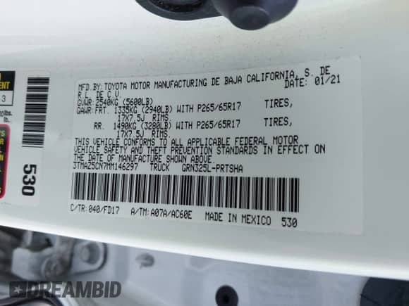 2021 Toyota Tacoma SR5 with VIN 3TMAZ5CN7MM146297, listed as a IAAI auction lot 43348248 with 46,809 mi miles and . Bid and sale history available at DreamBid. Image 9.