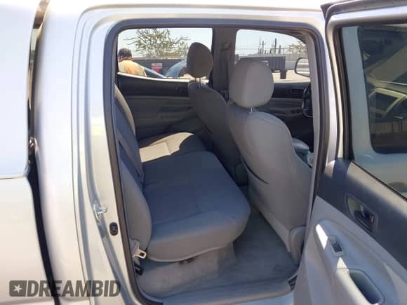 2005 Toyota Tacoma PreRunner with VIN 5TEKU72N65Z053095, listed as a IAAI auction lot 43017798 with 283,534 mi miles and . Bid and sale history available at DreamBid. Image 8.