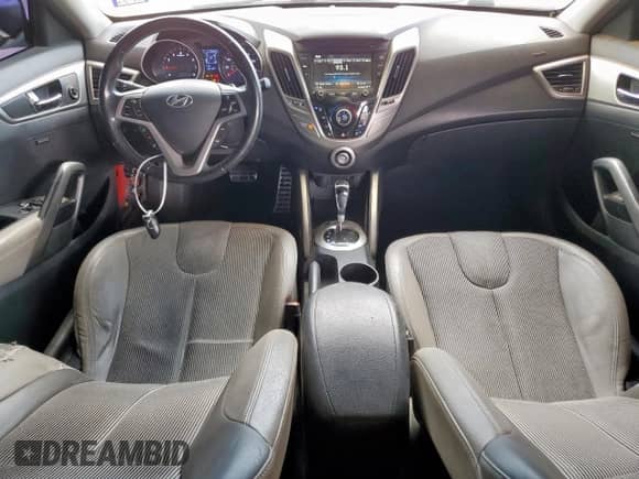 2012 Hyundai Veloster w/Gray Int z VIN KMHTC6AD2CU054207, wystawiony jako Copart lot #71825225 z przebiegiem 177 940 mil mil oraz Szkoda całkowita • Salvage title. Historia ofert i sprzedaży dostępna na DreamBid. Obrazek 8.