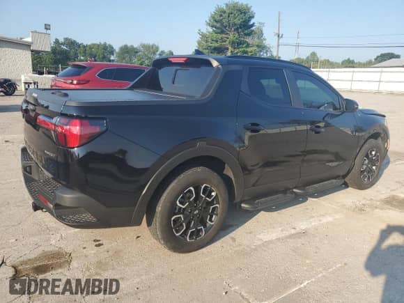 2023 Hyundai Santa Cruz SEL Premium with VIN 5NTJDDAF2PH041232, listed as a Copart auction lot 66308024 with 34,856 mi miles and Salvage title. Bid and sale history available at DreamBid. Image 3.