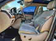 2012 Jeep Grand Cherokee Overland with VIN 1C4RJFCT9CC346497, listed as a Copart auction lot 63004635 with 142,623 mi miles and Salvage title. Bid and sale history available at DreamBid. Image 7.