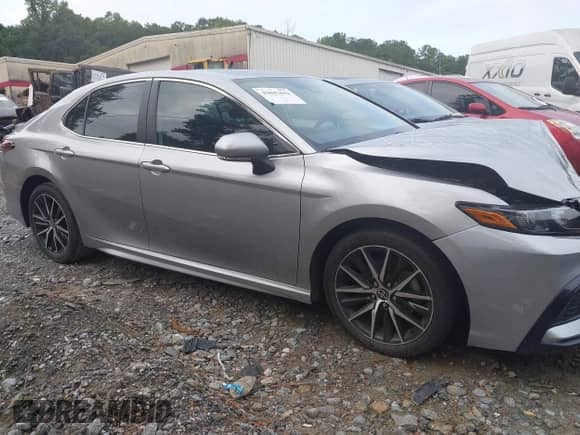 2023 Toyota Camry SE z VIN 4T1G11AK2PU829555, wystawiony jako IAAI lot #43047642 z przebiegiem 25 983 mil mil oraz . Historia ofert i sprzedaży dostępna na DreamBid. Obrazek 13.