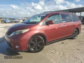 2014 Toyota Sienna SE with VIN 5TDXK3DC5ES442131, listed as a Copart auction lot 87235315 with 98,342 mi miles and Clean title. Bid and sale history available at DreamBid. Image 1.