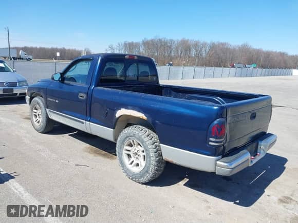 2001 Dodge Dakota with VIN 1B7FL26X41S182146, listed as a IAAI auction lot 41802021 with 202,073 mi miles and . Bid and sale history available at DreamBid. Image 3.