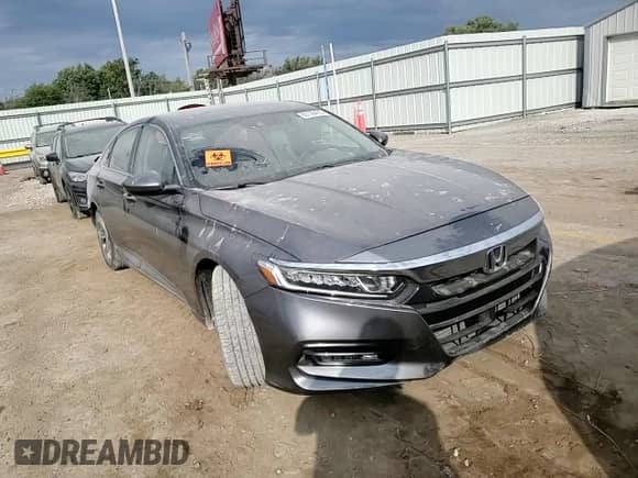 2018 Honda Accord EX-L с VIN 1HGCV1F51JA116943, выставлен на аукционе Copart как лот 85136425 с пробегом 77 953 миль миль и Списание • Salvage title. История ставок и продаж доступна на DreamBid. Изображение 13.