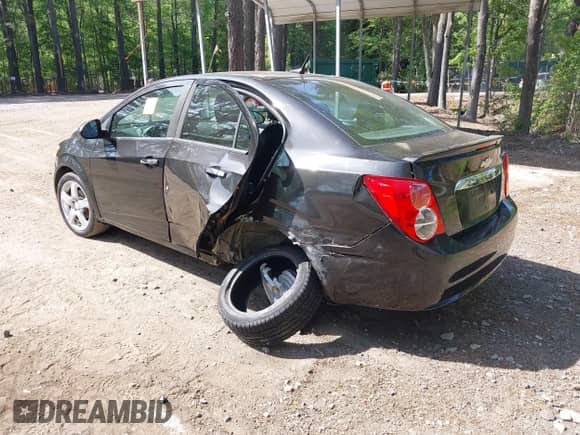 2013 Chevrolet Sonic LTZ with VIN 1G1JE5SH4D4113866, listed as a IAAI auction lot 42153781 with 130,122 mi miles and . Bid and sale history available at DreamBid. Image 3.