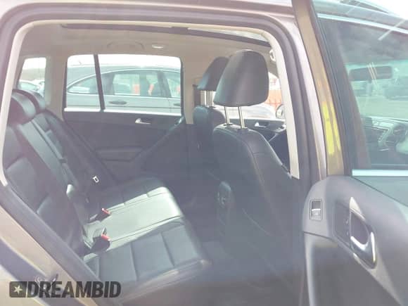 2011 Volkswagen Tiguan S with VIN WVGBV7AX2BW533378, listed as a IAAI auction lot 41922023 with 110,452 mi miles and . Bid and sale history available at DreamBid. Image 8.