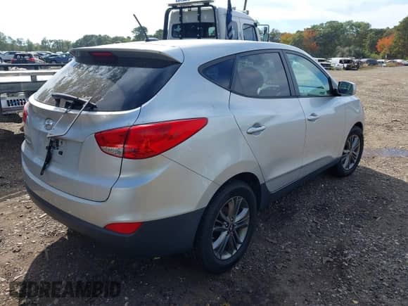 2014 Hyundai Tucson GLS with VIN KM8JT3AF3EU818737, listed as a IAAI auction lot 43406530 with 140,231 mi miles and . Bid and sale history available at DreamBid. Image 4.