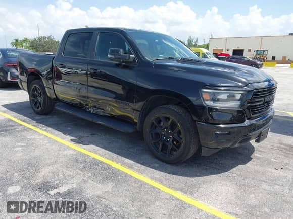 2023 Ram 1500 Laramie z VIN 1C6SRFJT2PN540528, wystawiony jako IAAI lot #43088337 z przebiegiem 48 724 mil mil oraz . Historia ofert i sprzedaży dostępna na DreamBid. Obrazek 1.