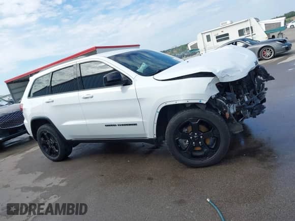 2018 Jeep Grand Cherokee Laredo E with VIN 1C4RJFAG1JC370361, listed as a IAAI auction lot 43284928 with 75,952 mi miles and . Bid and sale history available at DreamBid. Image 13.