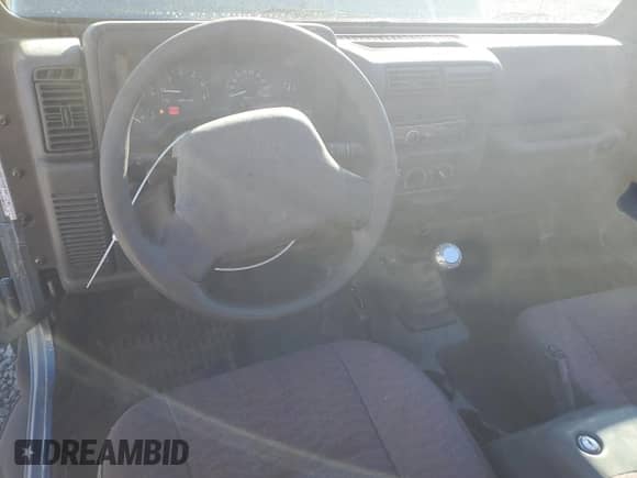 1999 Jeep Wrangler Sport with VIN 1J4FY19S1XP455674, listed as a Copart auction lot 86821605 with 218,356 mi miles and Clean title. Bid and sale history available at DreamBid. Image 8.