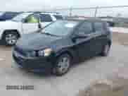 2014 Chevrolet Sonic LT with VIN 1G1JC6SB9E4234627, listed as a IAAI auction lot 42369440 with 63,098 mi miles and . Bid and sale history available at DreamBid. Image 2.