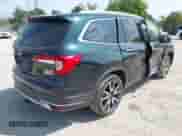 2019 Honda Pilot Touring 7-Passenger with VIN 5FNYF6H66KB089252, listed as a IAAI auction lot 42936805 with 75,454 mi miles and . Bid and sale history available at DreamBid. Image 4.