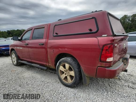 2012 Ram 1500 Express z VIN 1C6RD6KT4CS236348, wystawiony jako Copart lot #85896675 z przebiegiem 229 894 mil mil oraz Czysty tytuł • Clean title. Historia ofert i sprzedaży dostępna na DreamBid. Obrazek 2.