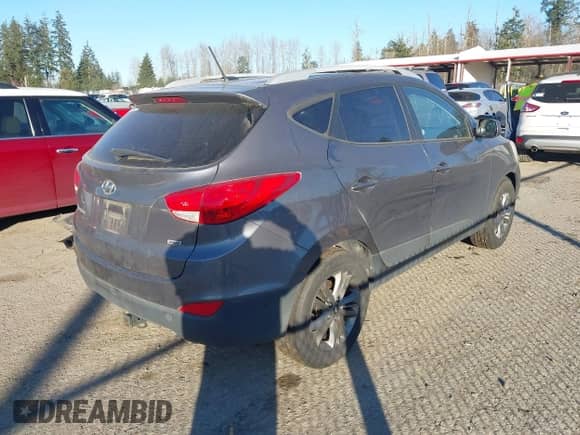 2014 Hyundai Tucson Walking Dead Edition z VIN KM8JUCAG1EU808097, wystawiony jako IAAI lot #41436214 z przebiegiem 114 198 mil mil oraz . Historia ofert i sprzedaży dostępna na DreamBid. Obrazek 4.