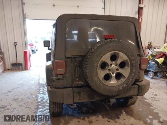 2016 Jeep Wrangler Sahara with VIN 1C4AJWBG0GL123367, listed as a IAAI auction lot 41406370 with 105,110 mi miles and . Bid and sale history available at DreamBid. Image 16.