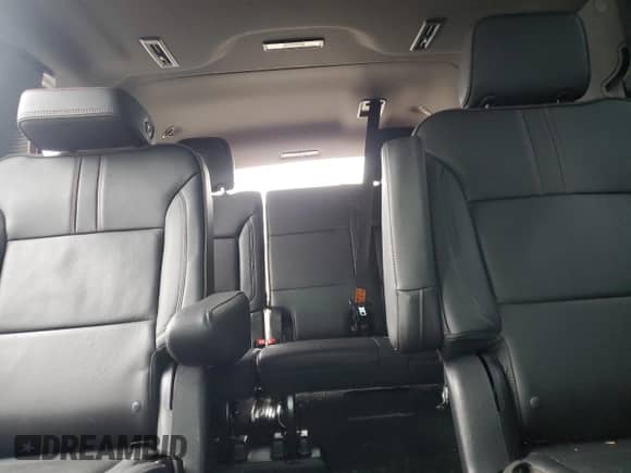 2023 Chevrolet Suburban RST с VIN 1GNSKEKD5PR354447, выставлен на аукционе Copart как лот 45123445 с пробегом 19 521 миль миль и Списание • Salvage title. История ставок и продаж доступна на DreamBid. Изображение 10.