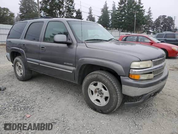 2002 Chevrolet Tahoe LT with VIN 1GNEK13Z42J246098, listed as a Copart auction lot 71029665 with 200,345 mi miles and Salvage title. Bid and sale history available at DreamBid. Image 4.
