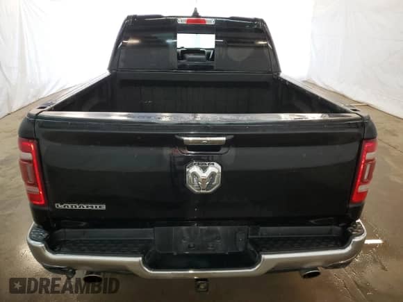 2020 Ram 1500 Laramie z VIN 1C6RREJT0LN238318, wystawiony jako Copart lot #52571805 z przebiegiem Nie podano mil oraz Czysty tytuł • Clean title. Historia ofert i sprzedaży dostępna na DreamBid. Obrazek 6.