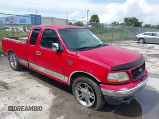 1999 Ford F-150 z VIN 1FTRX17W5XNC21917, wystawiony jako IAAI lot #42997563 z przebiegiem Nie podano mil oraz . Historia ofert i sprzedaży dostępna na DreamBid. Obrazek 1.