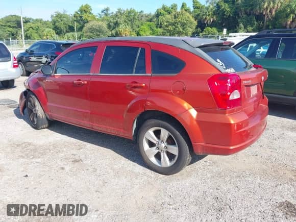 2010 Dodge Caliber SXT with VIN 1B3CB4HA4AD632362, listed as a IAAI auction lot 43130784 with 192,276 mi miles and . Bid and sale history available at DreamBid. Image 3.