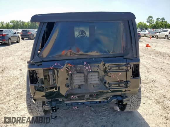 2023 Jeep Wrangler Sport S with VIN 1C4HJXDG7PW526195, listed as a Copart auction lot 66521735 with 54,082 mi miles and Salvage title. Bid and sale history available at DreamBid. Image 6.