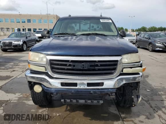 2005 GMC Sierra 1500 SLE z VIN 2GTEK13T751200347, wystawiony jako Copart lot #60863495 z przebiegiem 272 891 mil mil oraz Czysty tytuł • Clean title. Historia ofert i sprzedaży dostępna na DreamBid. Obrazek 5.