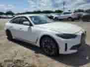 2024 BMW i4 eDrive35 with VIN WBY43AW03RFR59830, listed as a Copart auction lot 70283535 with 23,026 mi miles and Salvage title. Bid and sale history available at DreamBid. Image 4.