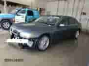 2002 BMW 7 Series 745Li with VIN WBAGN63472DR04910, listed as a Copart auction lot 84754005 with 140,016 mi miles and Salvage title. Bid and sale history available at DreamBid. Image 1.