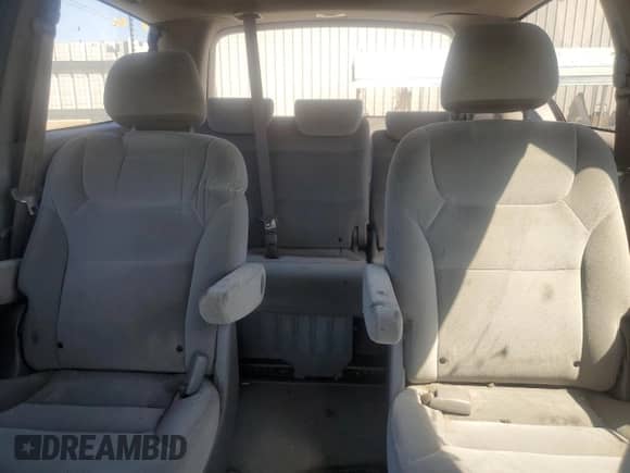 2010 Honda Odyssey LX с VIN 5FNRL3H28AB062710, выставлен на аукционе Copart как лот 71060715 с пробегом 240 460 миль миль и Списание • Salvage title. История ставок и продаж доступна на DreamBid. Изображение 10.