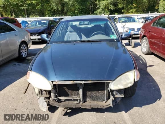 2000 Hyundai Elantra GLS z VIN KMHJF35F0YU935049, wystawiony jako Copart lot #71959385 z przebiegiem 119 494 mil mil oraz Szkoda całkowita • Salvage title. Historia ofert i sprzedaży dostępna na DreamBid. Obrazek 5.