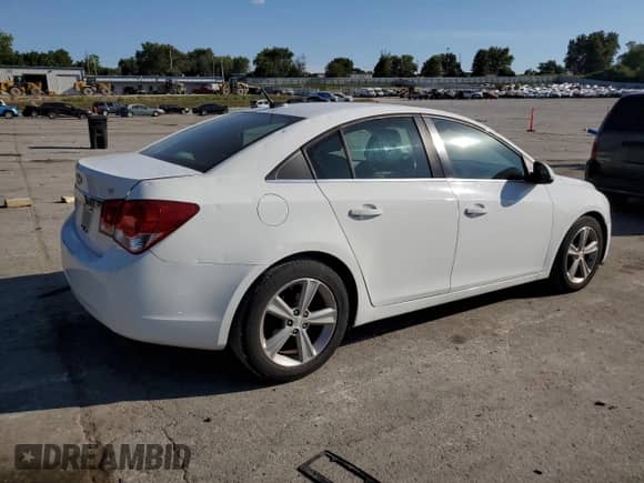 2013 Chevrolet Cruze 2LT z VIN 1G1PE5SB9D7245266, wystawiony jako Copart lot #70882115 z przebiegiem 152 070 mil mil oraz Czysty tytuł • Clean title. Historia ofert i sprzedaży dostępna na DreamBid. Obrazek 3.