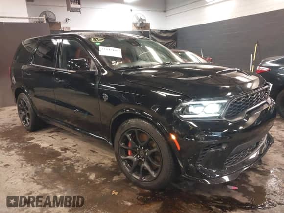 2023 Dodge Durango SRT Hellcat with VIN 1C4SDJH98PC585330, listed as a IAAI auction lot 41047195 with 7,744 mi miles and . Bid and sale history available at DreamBid. Image 1.